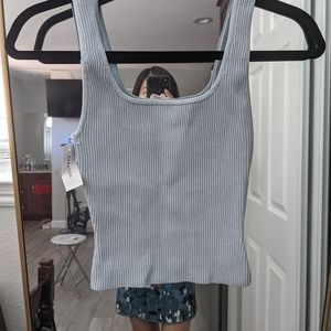 Light blue sculpted tank